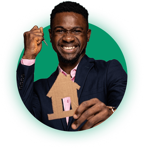 Happy renter holding a cardboard house